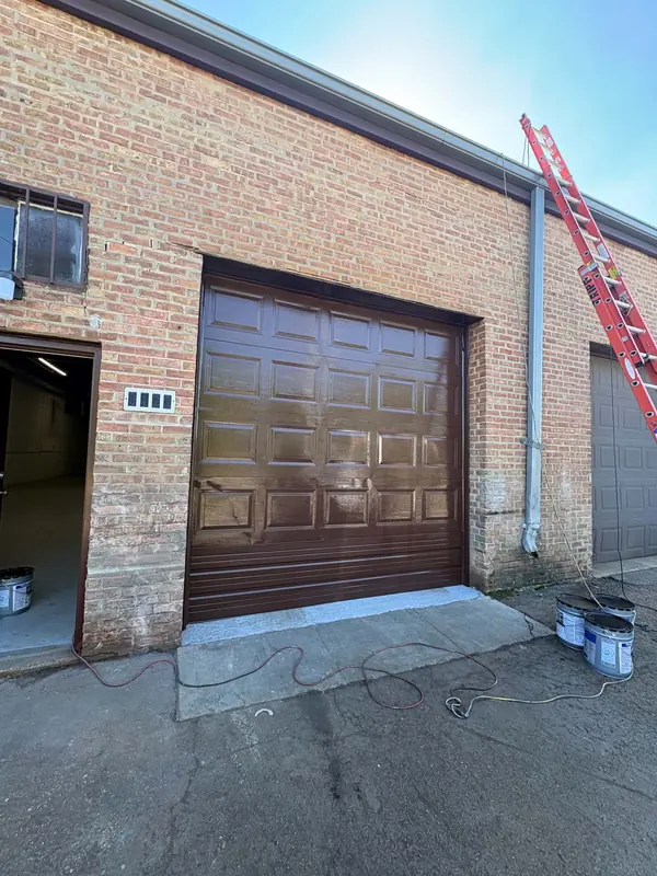 Garage door after a fresh spray-applied finish